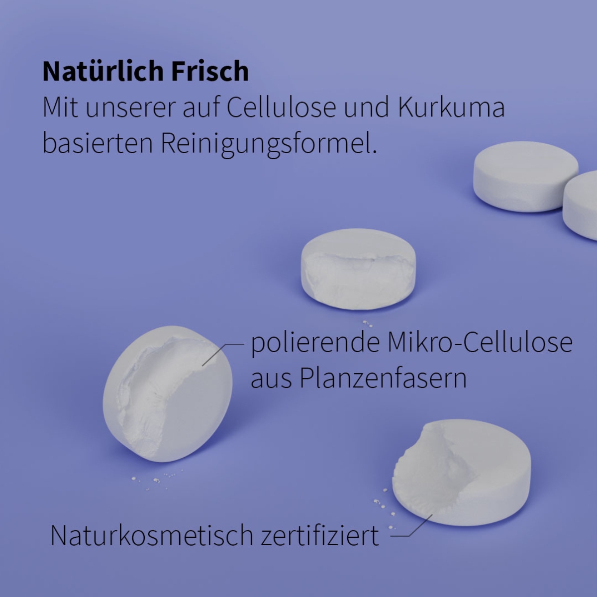 Weisse Zahnputztabletten mit Bruchkanten und Text zur natuerlichen Reinigung mit Cellulose und Kurkuma