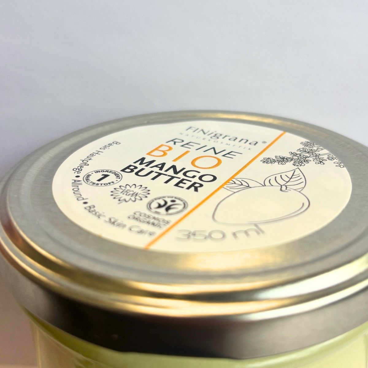 Deckelansicht der Bio-Mangobutter mit Etikett_ Logos und 350 ml-Angabe