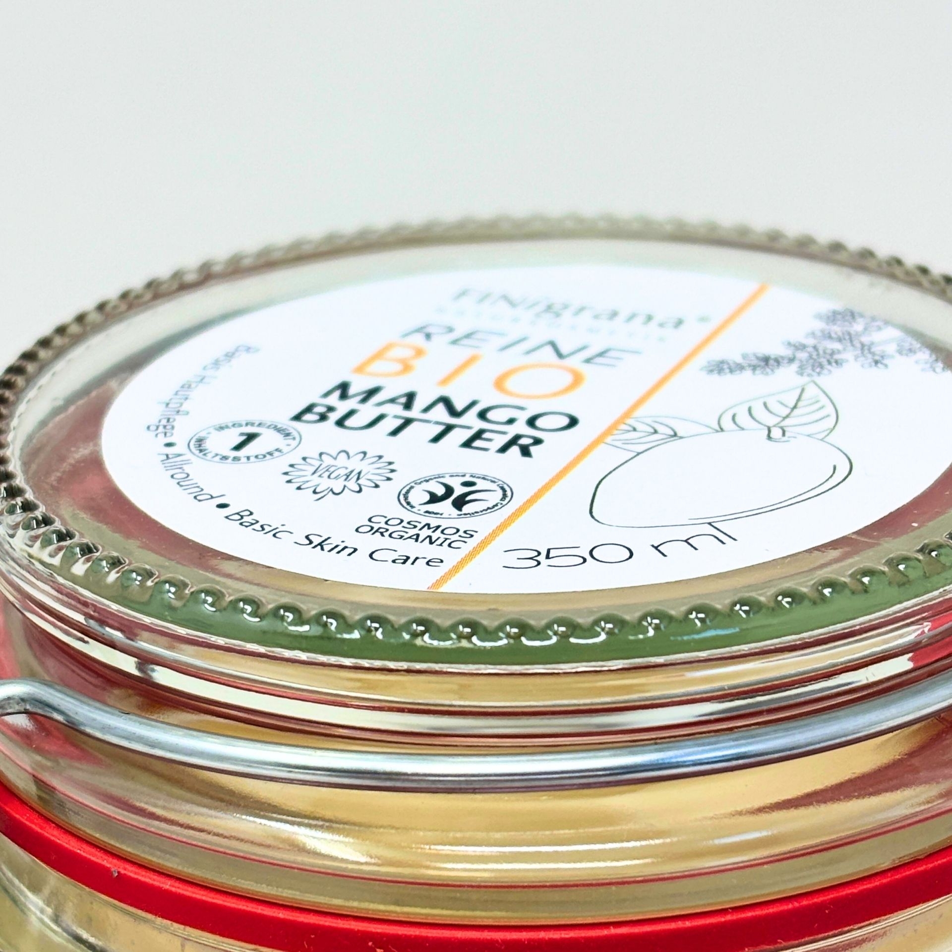 Deckelansicht der Bio-Mangobutter mit Etikett_ Logos und 350 ml-Angabe