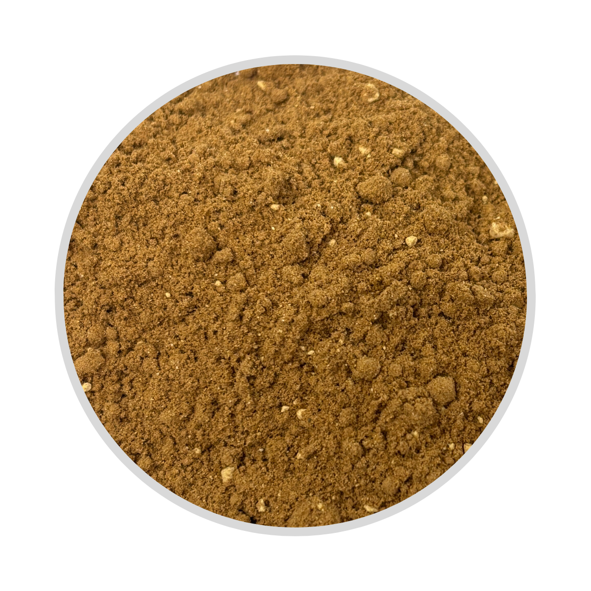 Nahaufnahme von braunem Kompoettken Dessertgewuerz in kreisfoermigem Ausschnitt