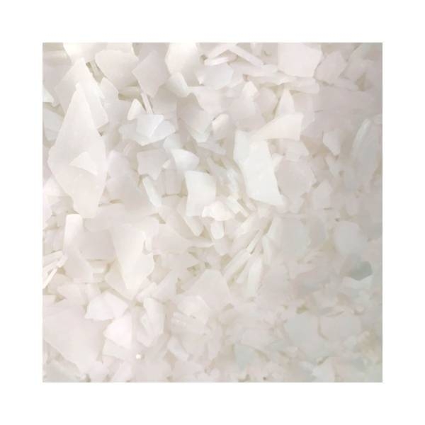 Nahaufnahme weisser Magnesium Flakes in Flockenform